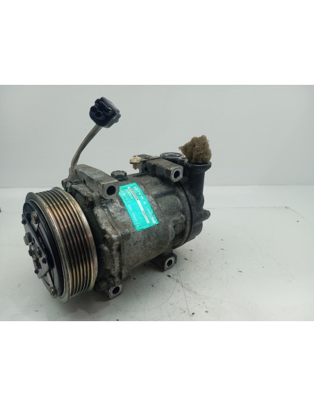 Recambio de compresor aire acondicionado para ford fiesta (cbk) ambiente referencia OEM IAM SD7V161257  