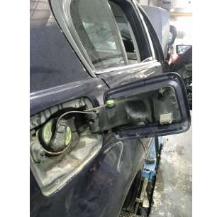 TAPA EXTERIOR COMBUSTIBLE... 2