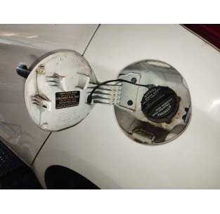 TAPA EXTERIOR COMBUSTIBLE... 2