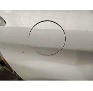 TAPA EXTERIOR COMBUSTIBLE...